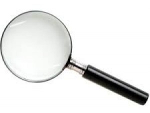Magnifying glass, lens or reader glasses to enable you to see the filing grooves on a surface